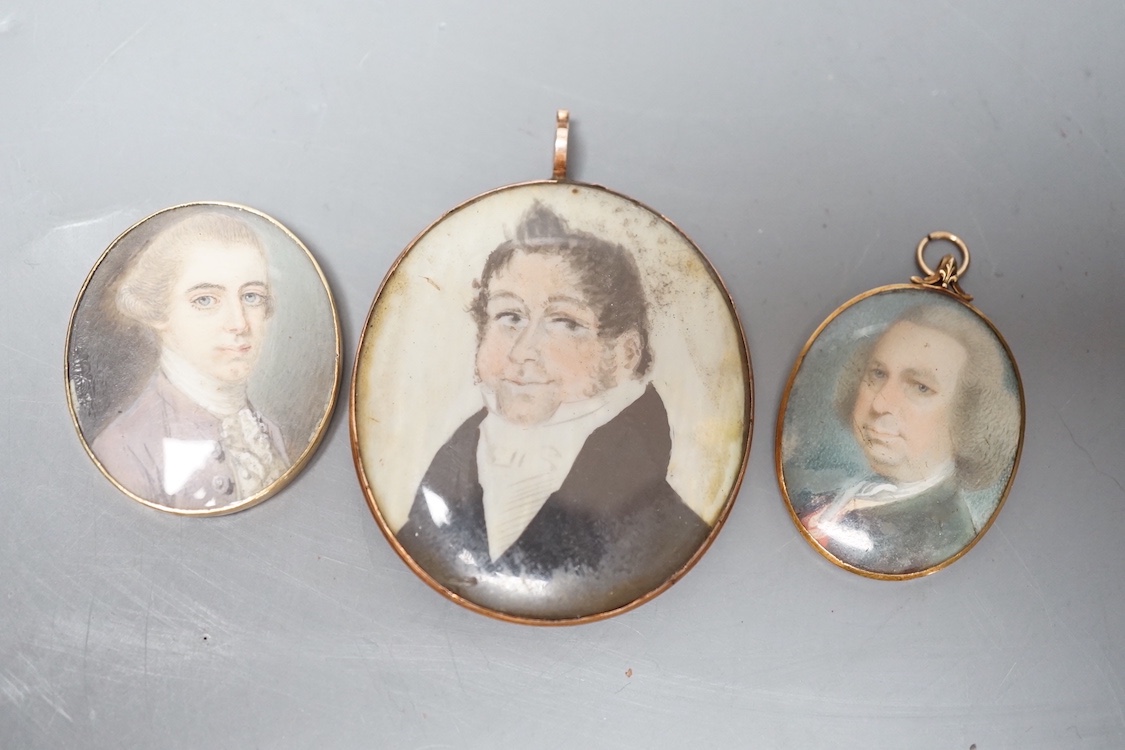 Three Georgian portrait miniatures on ivory of gentlemen, largest 5 cms high, two gold framed